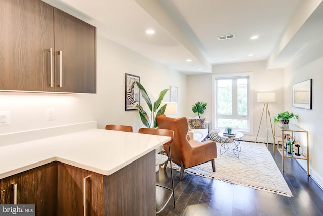 office area featuring dark wood-type flooring