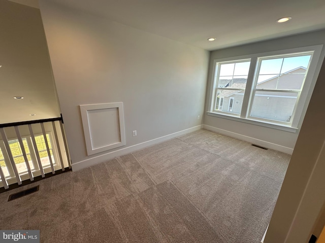 view of carpeted spare room