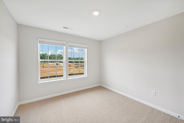 unfurnished room with carpet