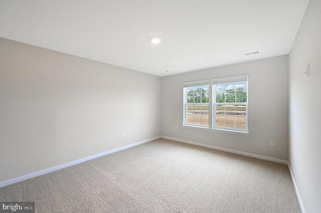 empty room with carpet floors