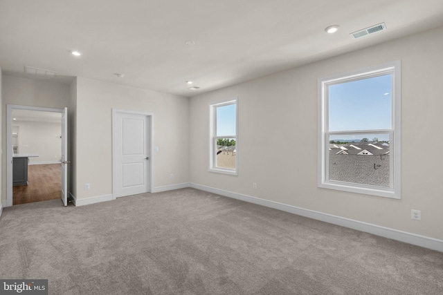 unfurnished bedroom with carpet floors