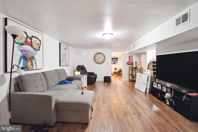 living room with wood-type flooring