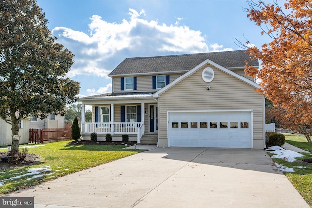 view of front facade featuring a porch, a garage, and a front lawn