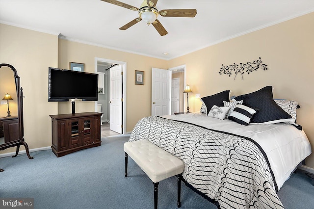 carpeted bedroom featuring ceiling fan and crown molding