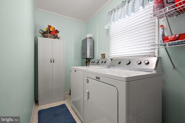 laundry area featuring washer and clothes dryer and crown molding