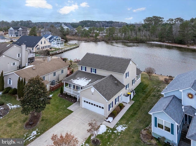 bird's eye view with a water view