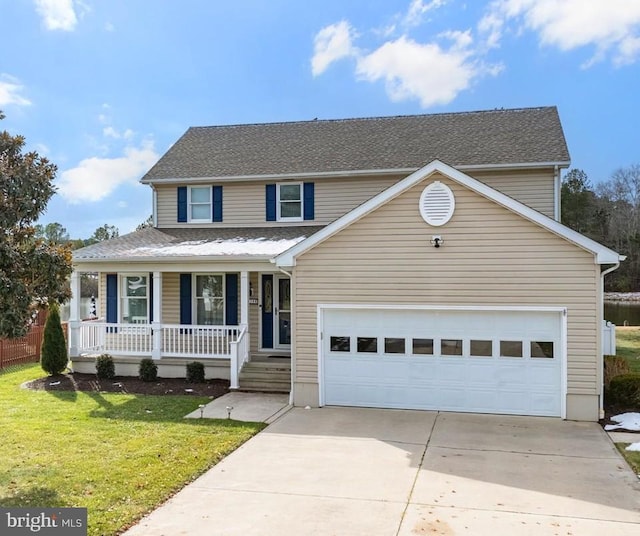 view of front of property with a garage, a front yard, and a porch