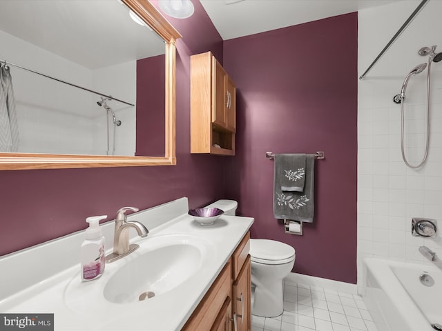 full bathroom with vanity, toilet, tiled shower / bath, and tile patterned flooring