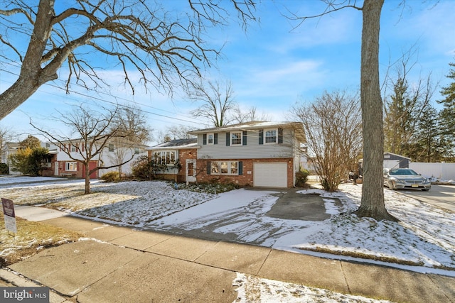 split level home with a garage