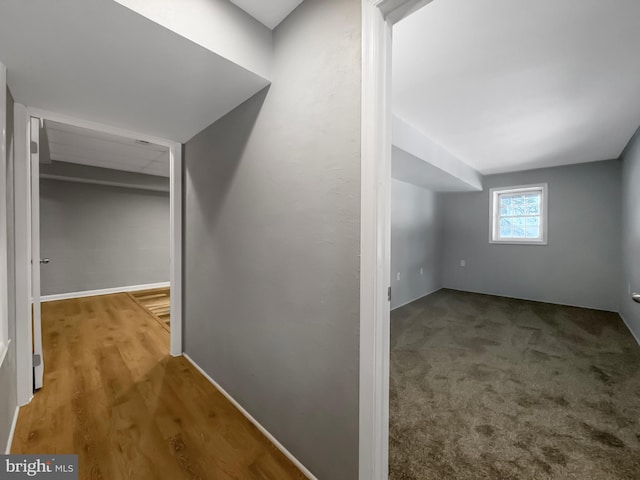 bonus room with hardwood / wood-style flooring