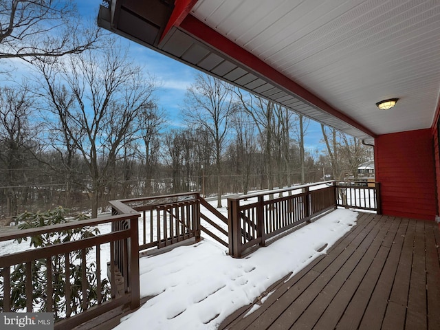 view of snow covered deck