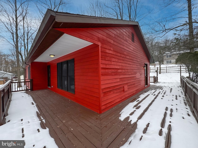 view of snow covered property