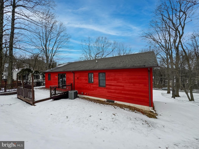 view of snow covered house