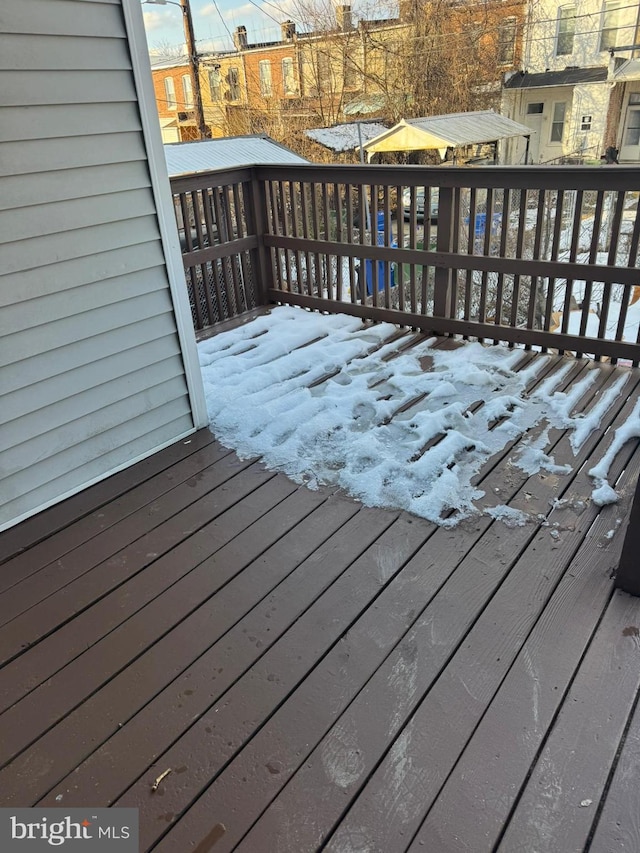 view of snow covered deck