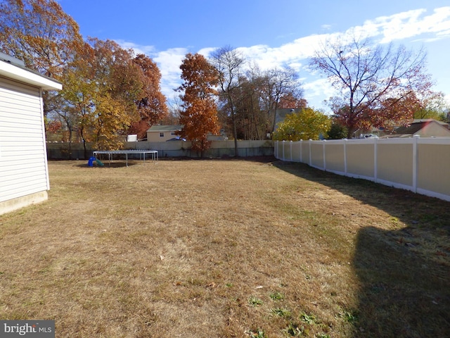 view of yard featuring a trampoline