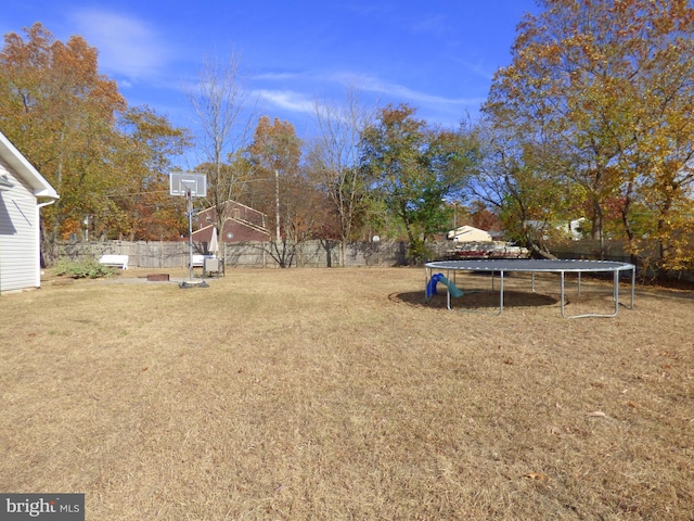 view of yard featuring a trampoline