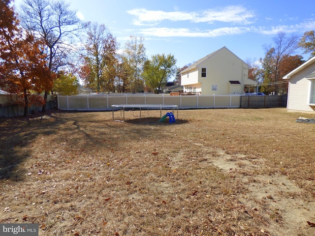 view of yard featuring a trampoline