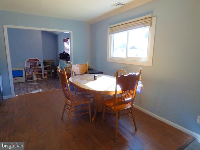 dining room featuring dark hardwood / wood-style floors