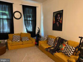 living room featuring ornamental molding