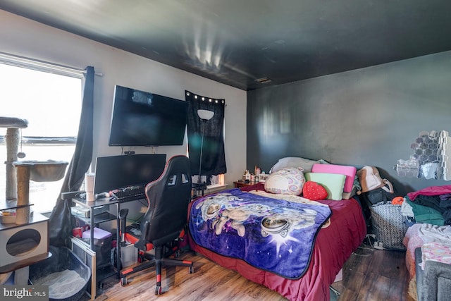 bedroom featuring hardwood / wood-style floors