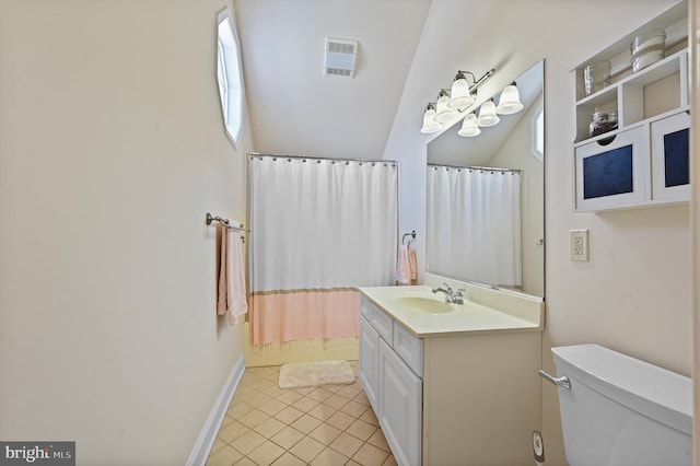 full bathroom featuring shower / bath combo with shower curtain, toilet, vanity, and tile patterned flooring