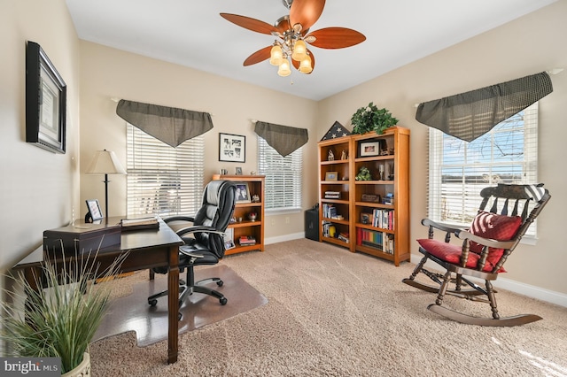 office area featuring ceiling fan and carpet floors