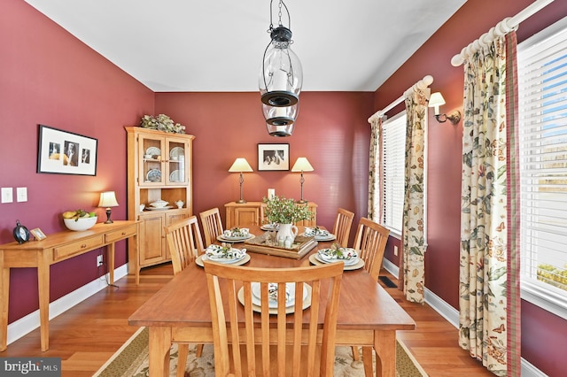 dining space featuring light hardwood / wood-style floors