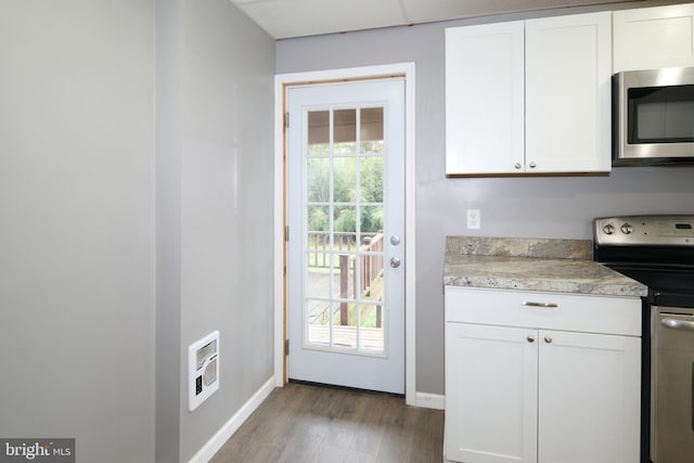 entryway featuring dark wood-type flooring