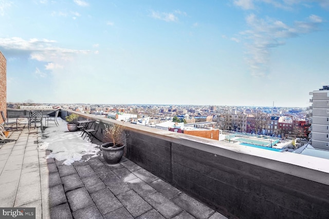 view of patio / terrace with a balcony