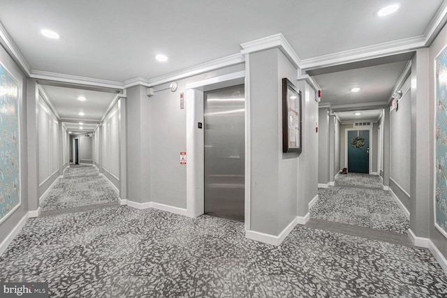 corridor featuring ornamental molding and elevator