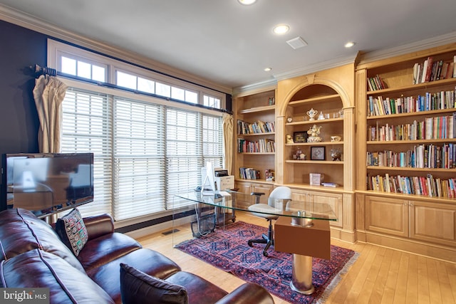 office space featuring visible vents, recessed lighting, light wood-style floors, and ornamental molding