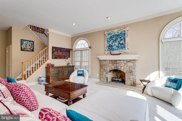 carpeted living area featuring stairway, a fireplace, baseboards, and ornamental molding