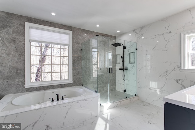 full bathroom with a marble finish shower, marble finish floor, stone wall, and a bath