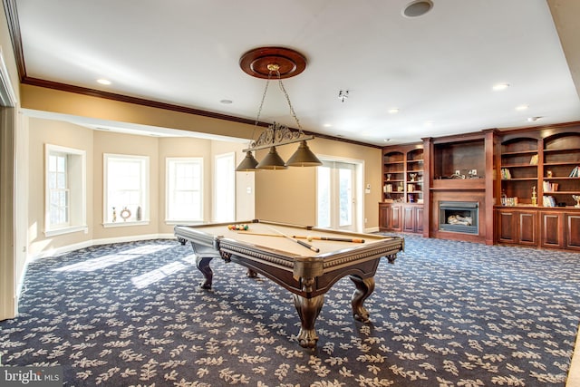 game room featuring a fireplace, baseboards, carpet floors, and ornamental molding