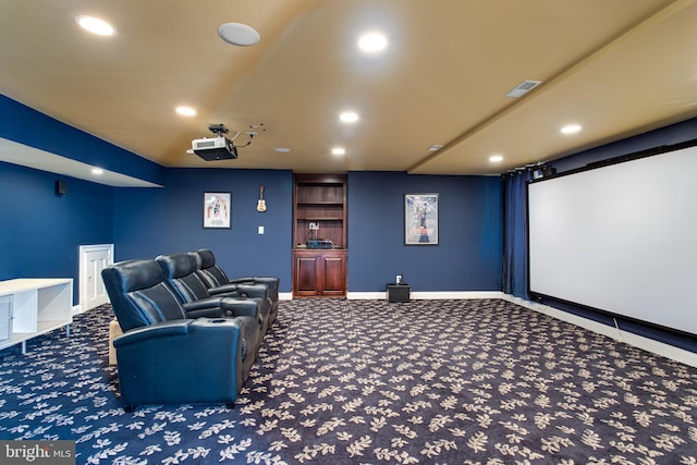 carpeted home theater room with recessed lighting, visible vents, and baseboards