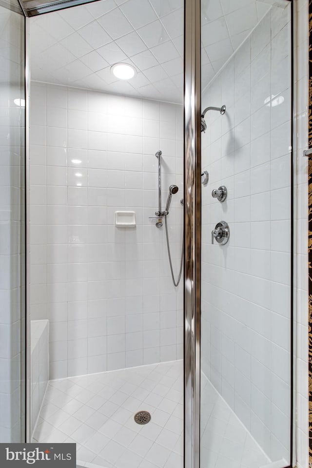 full bath featuring a stall shower