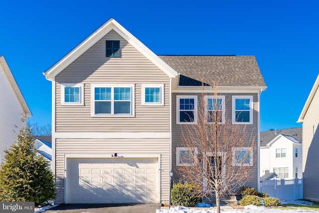 view of front of property featuring a garage