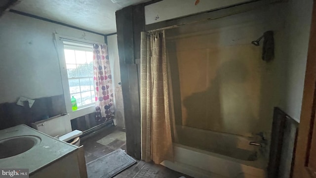 bathroom with vanity and shower / bath combo with shower curtain