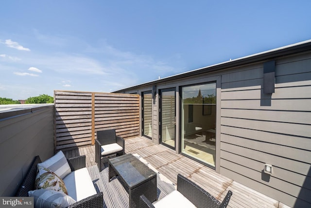 view of patio / terrace featuring a balcony and outdoor lounge area