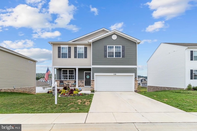 view of front of property featuring covered porch, a front lawn, and a garage