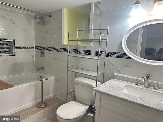 full bathroom with toilet, tiled shower / bath combo, a wall unit AC, and vanity