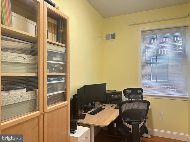 office with wood-type flooring