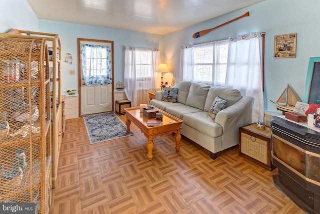 living room featuring light parquet flooring