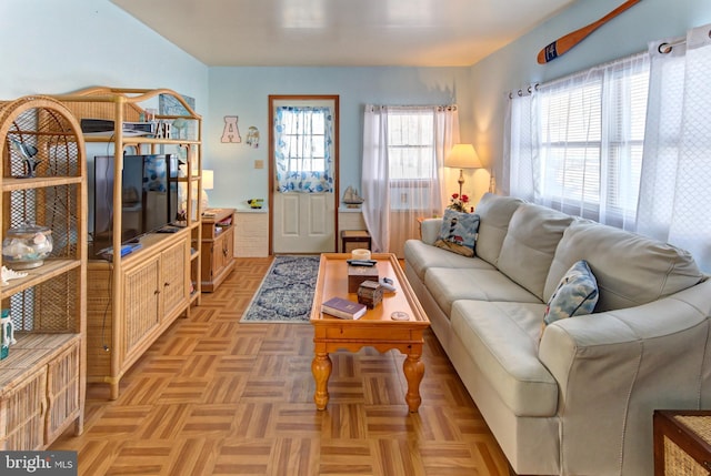 living room featuring light parquet floors