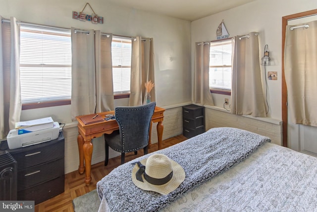 bedroom featuring parquet floors