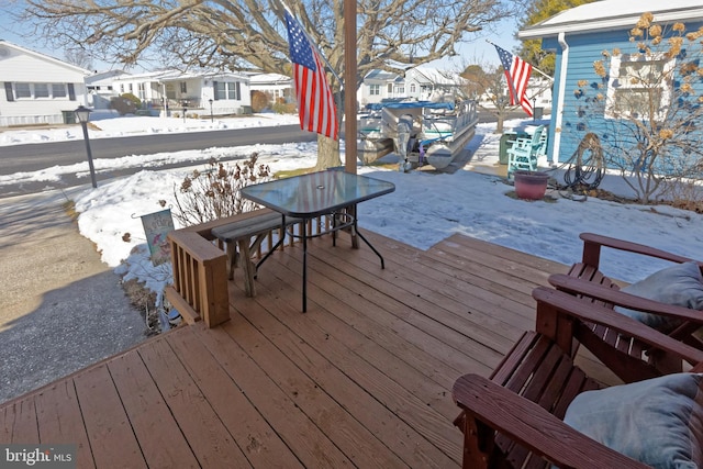 view of snow covered deck