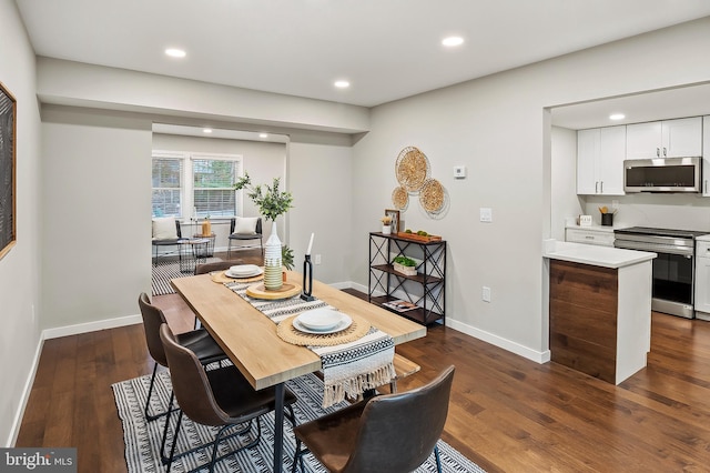 dining room with dark wood-type flooring