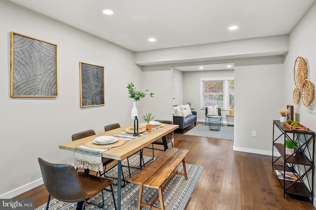 dining area featuring dark hardwood / wood-style flooring