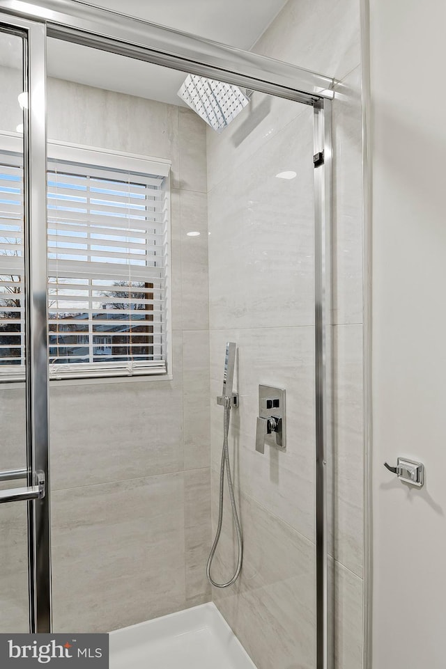 bathroom with an enclosed shower