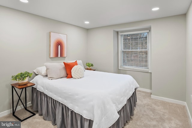 bedroom with light carpet